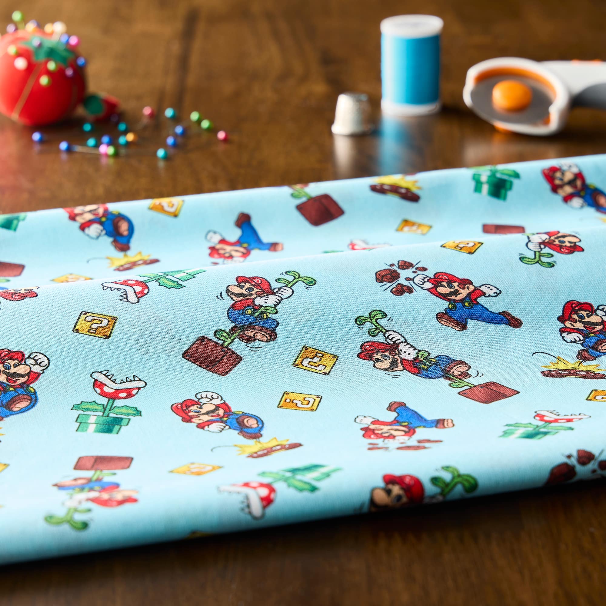 Nintendo® Super Mario™ Toss Cotton Fabric